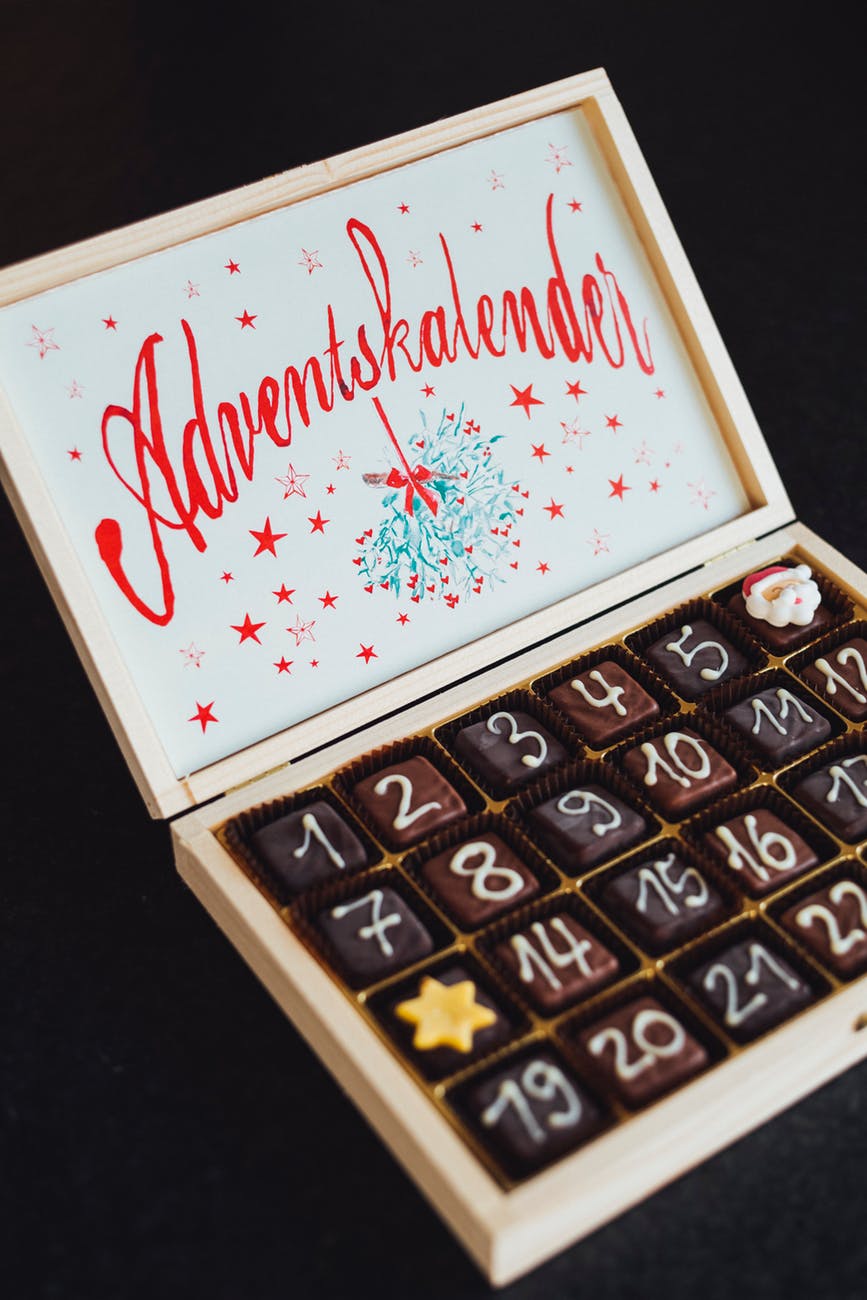 chocolates on white wooden box