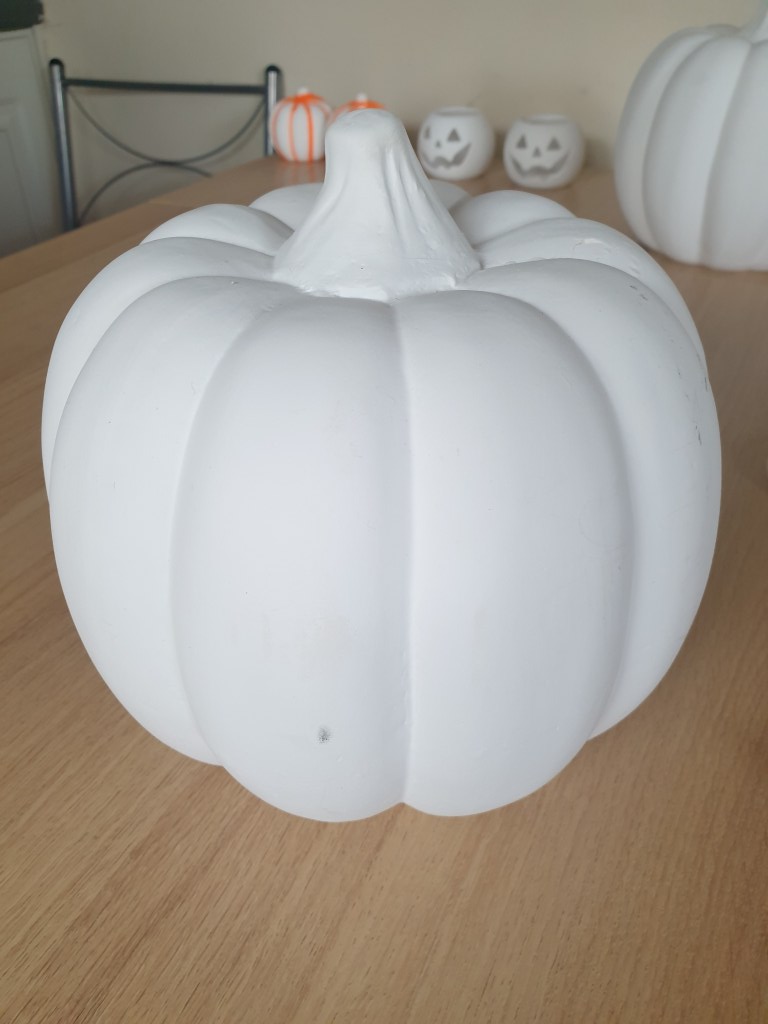 Basic white ceramic pumpkin for how to make this ceramic pumpkin dupe post.