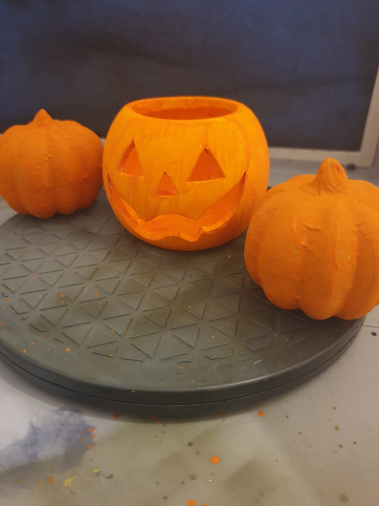 Finished painted Halloween decor for your home pumpkin and tealight holder.