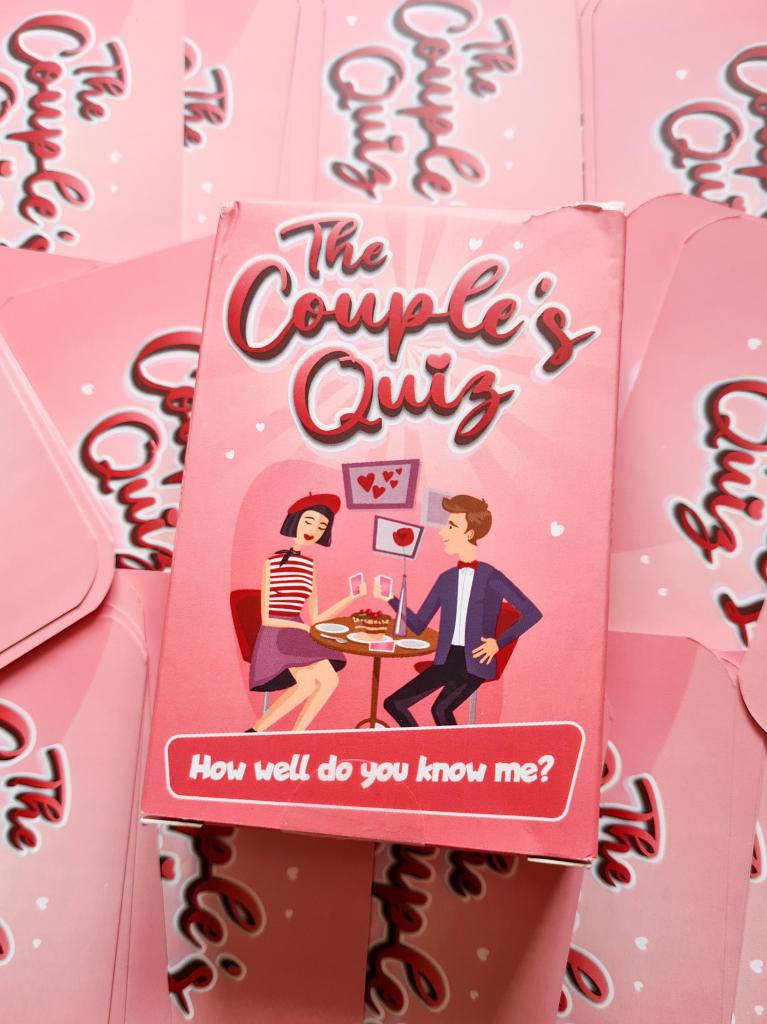 Flatlay of The Couples Quiz Game for how to host a great dinner party