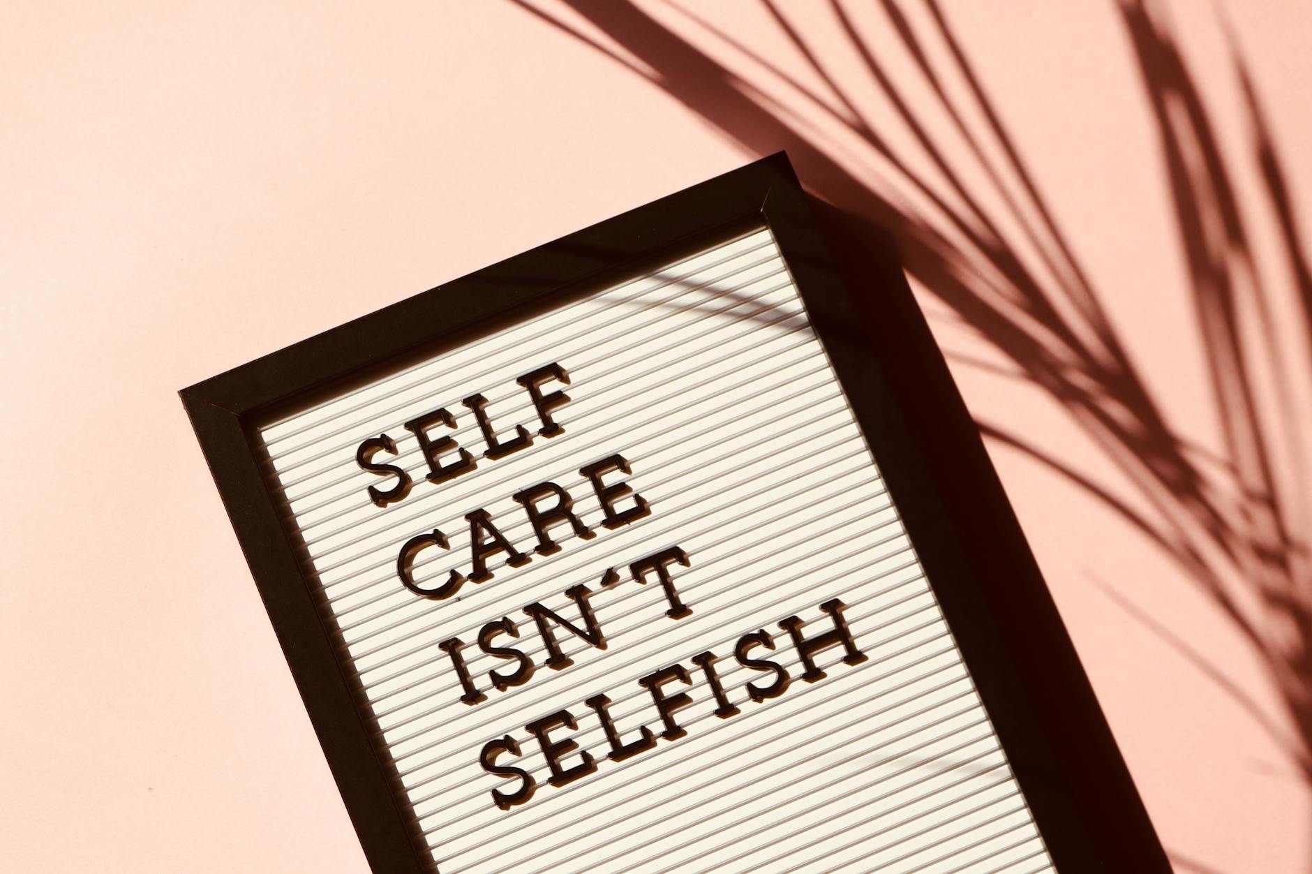 self care isn't selfish quote on pinboard