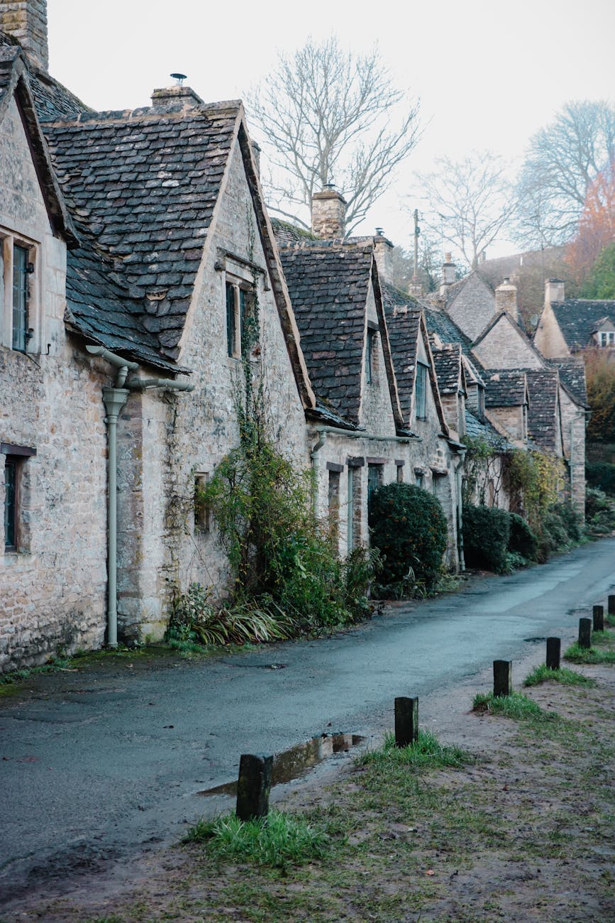 Row of old houses for Exploring the Cotswolds: Hidden Gems, Villages & Must-See Spots post